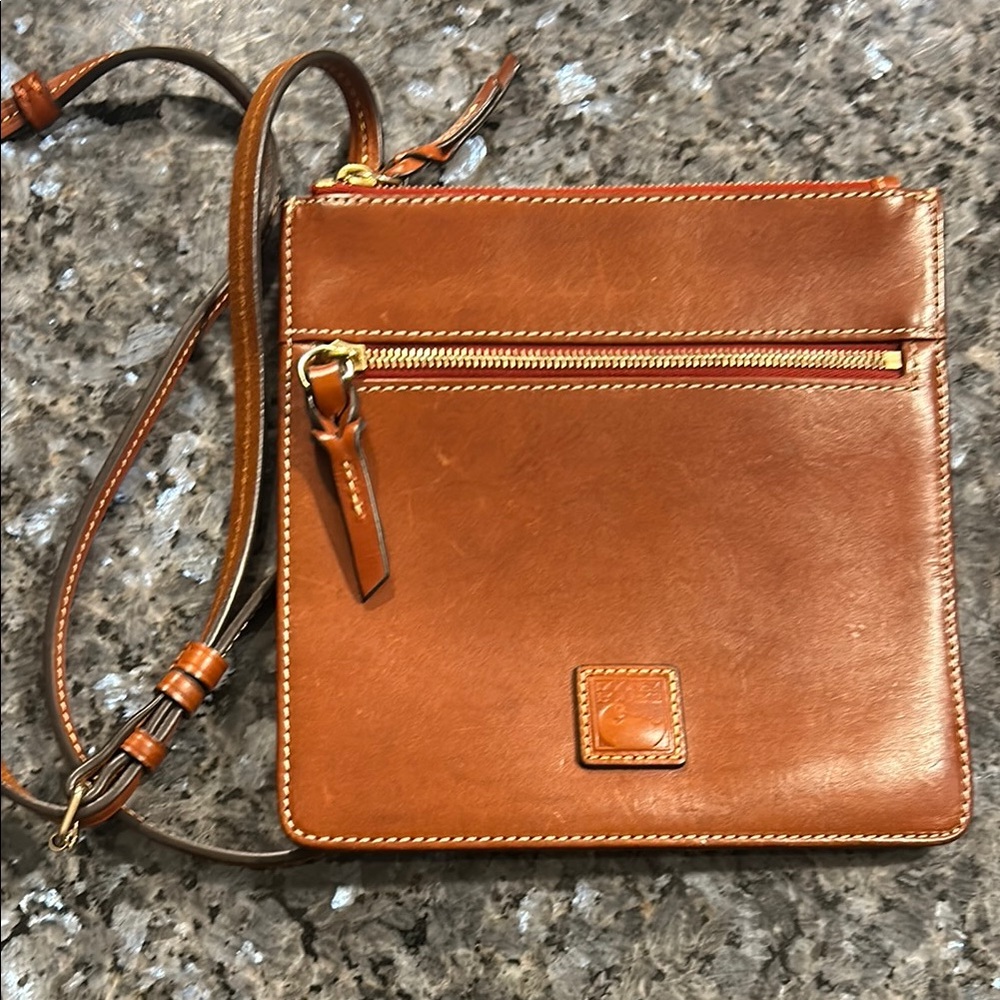 Dooney & Bourke Brown Messenger Bag with Leather Material and Gold Zipper